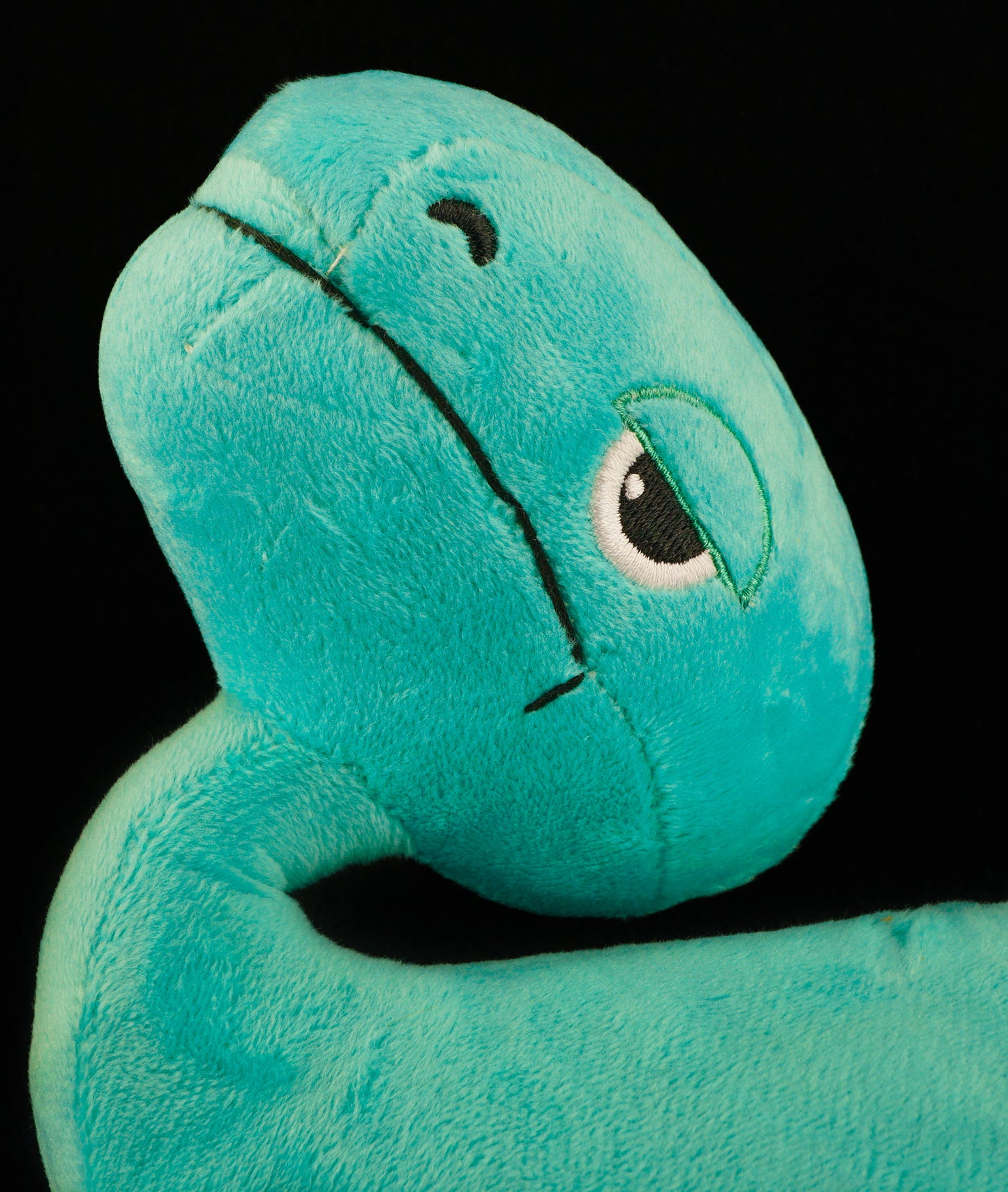 Mini Teal Bronto Plush Toy
