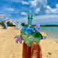 UV Faceted Neptunium Bird Traveler