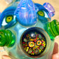 UV Faceted Neptunium Bird Traveler