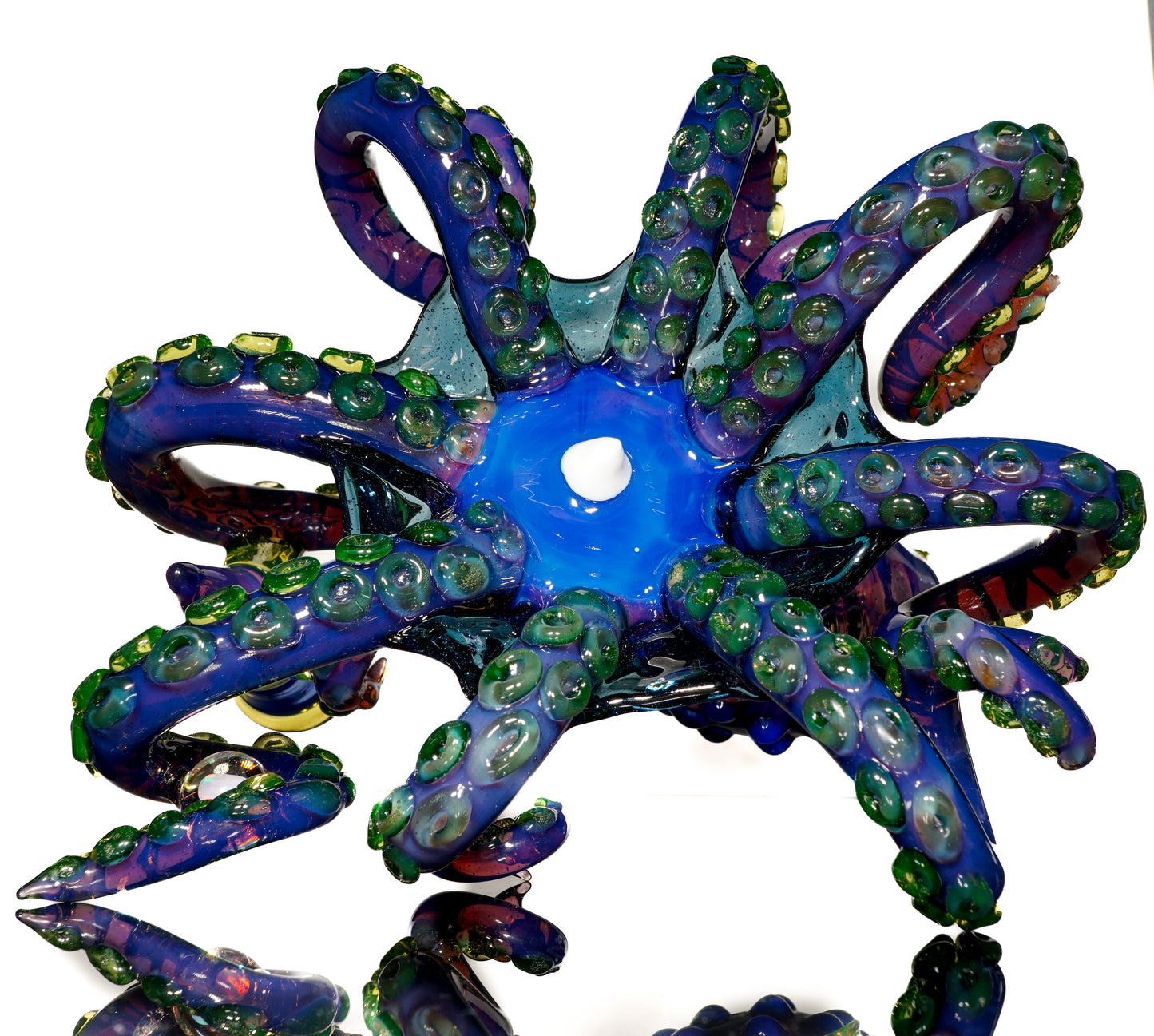 Dual-UV Ion and Atomic Stardust over Stardust Octopus