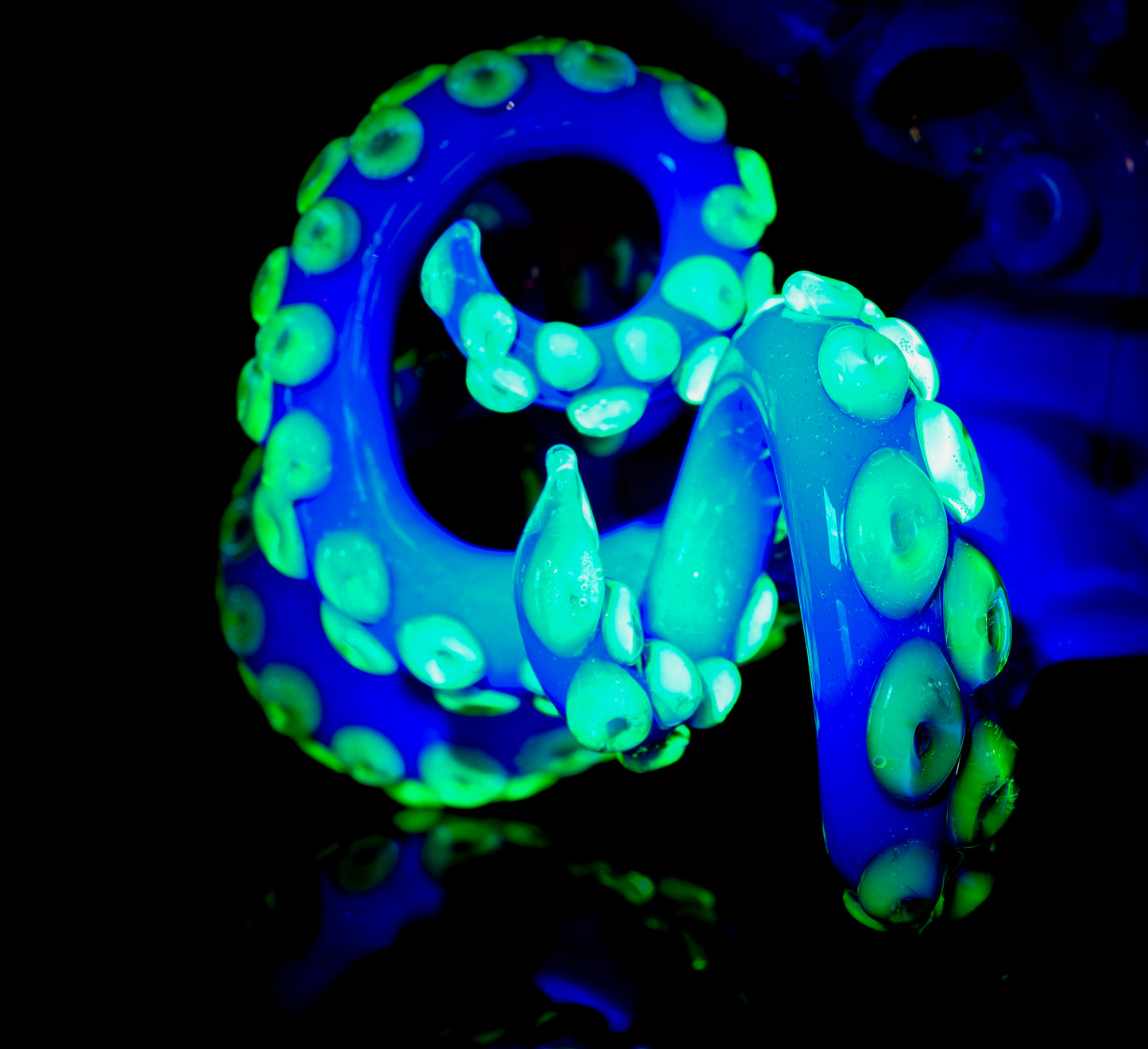 Dual-UV Ion and Atomic Stardust over Stardust Octopus