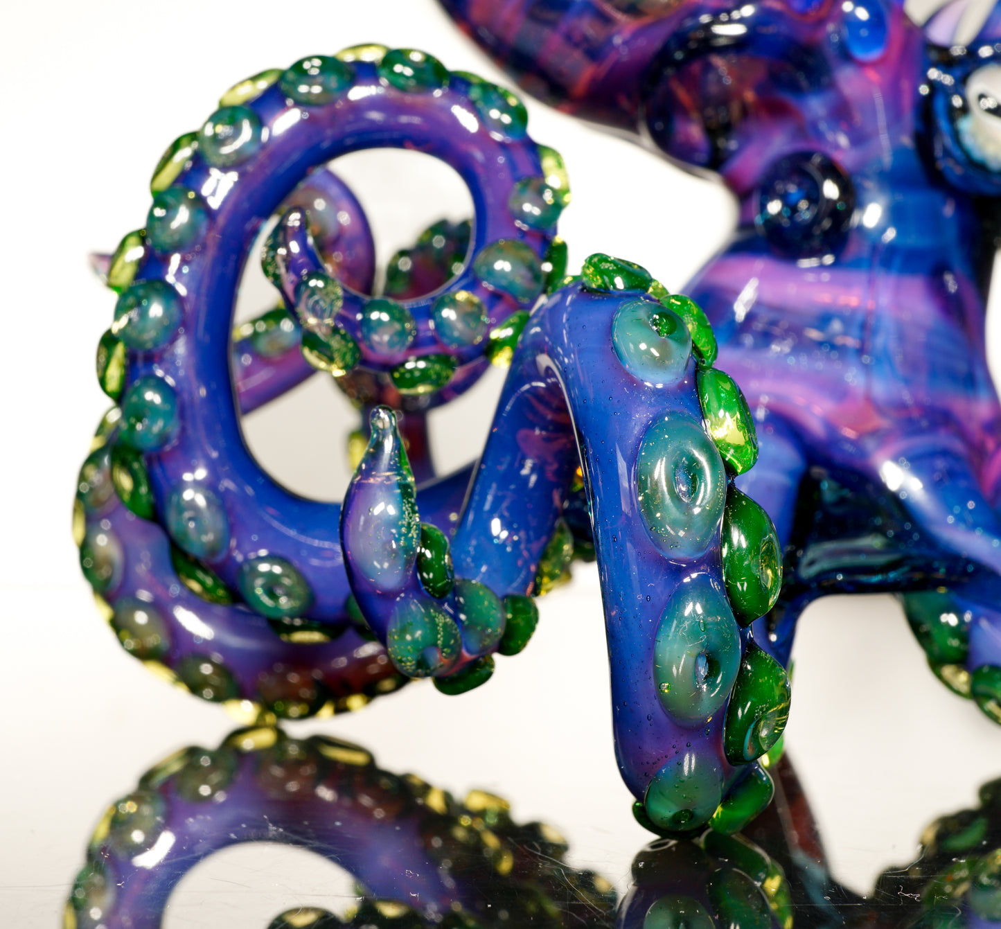 Dual-UV Ion and Atomic Stardust over Stardust Octopus