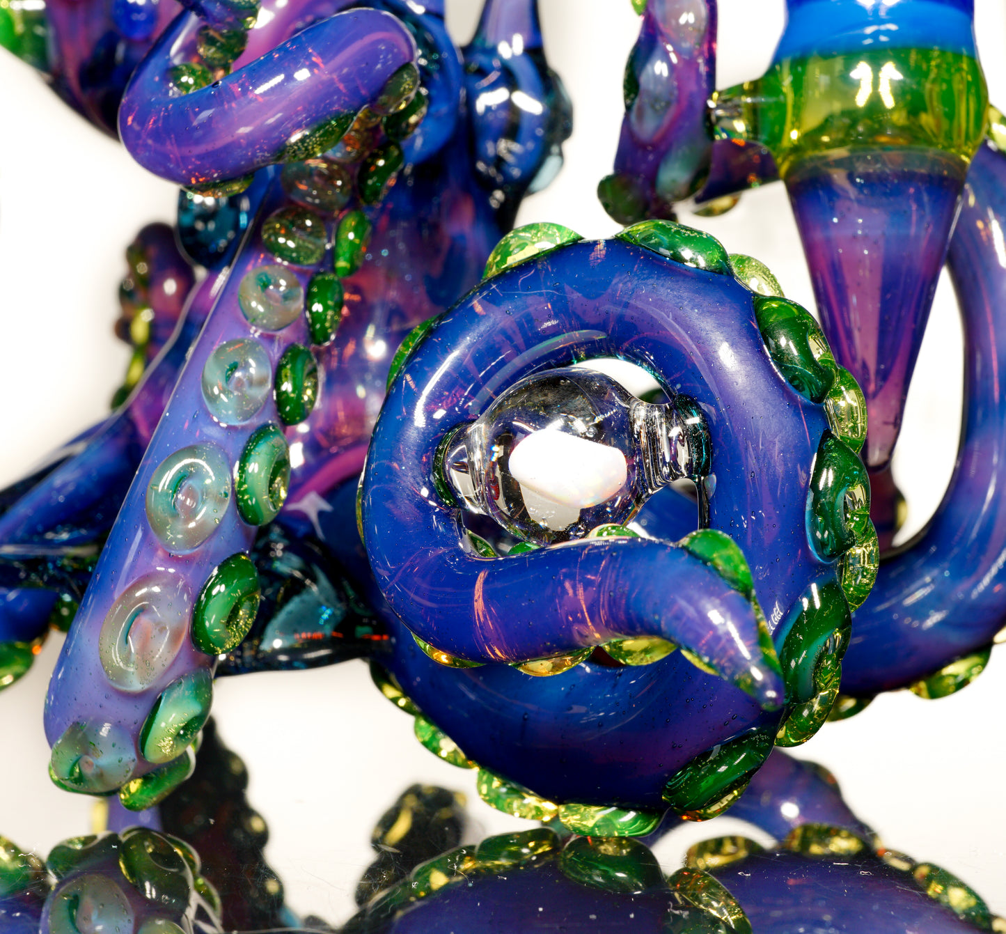 Dual-UV Ion and Atomic Stardust over Stardust Octopus