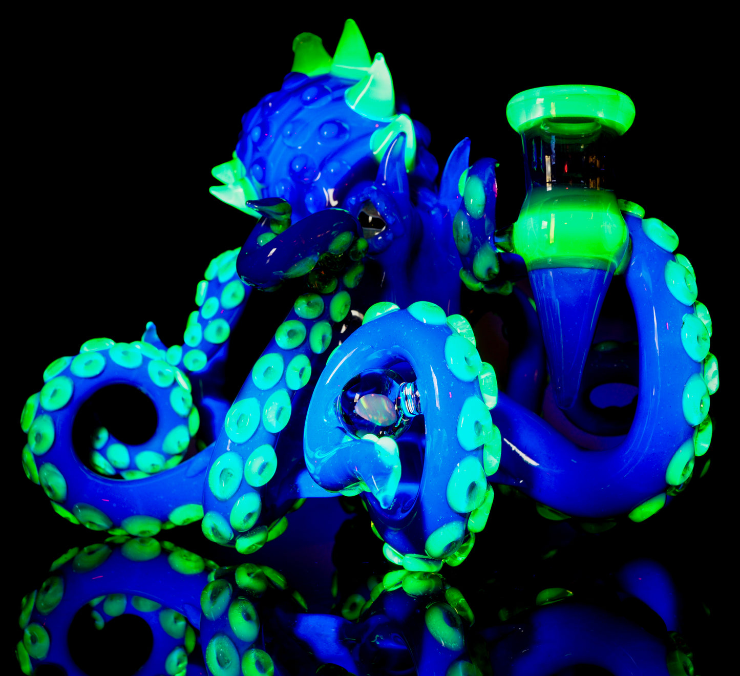 Dual-UV Ion and Atomic Stardust over Stardust Octopus