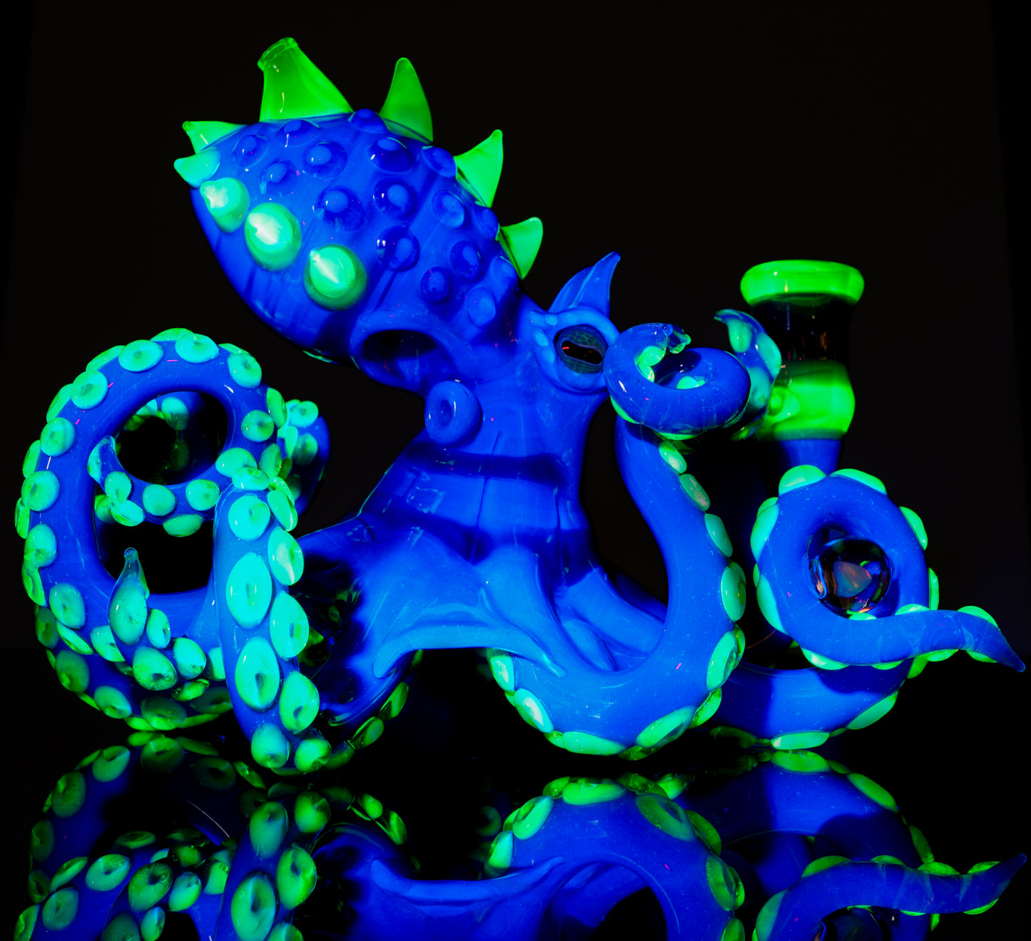 Dual-UV Ion and Atomic Stardust over Stardust Octopus