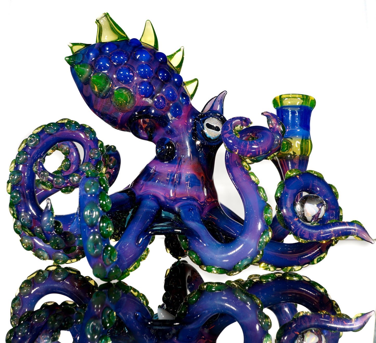 Dual-UV Ion and Atomic Stardust over Stardust Octopus