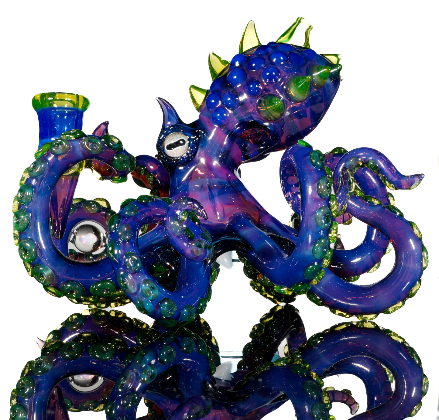 Dual-UV Ion and Atomic Stardust over Stardust Octopus