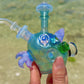 UV Faceted Neptunium Bird Traveler
